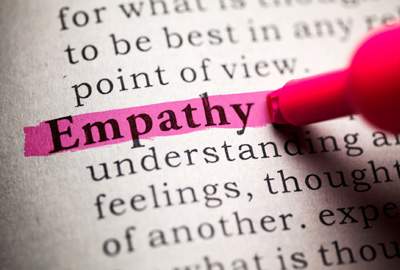 Empathy is the New Black - The word Empathy highlighted on a dictionary page.